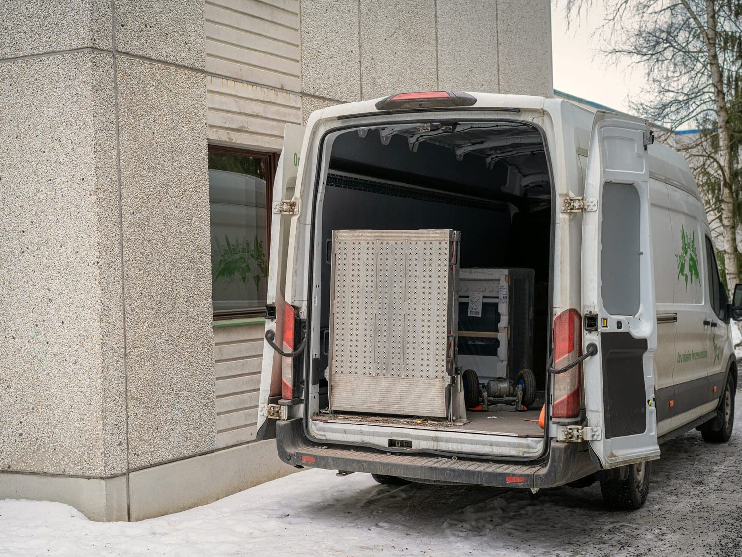 Loaded van with its rear doors open